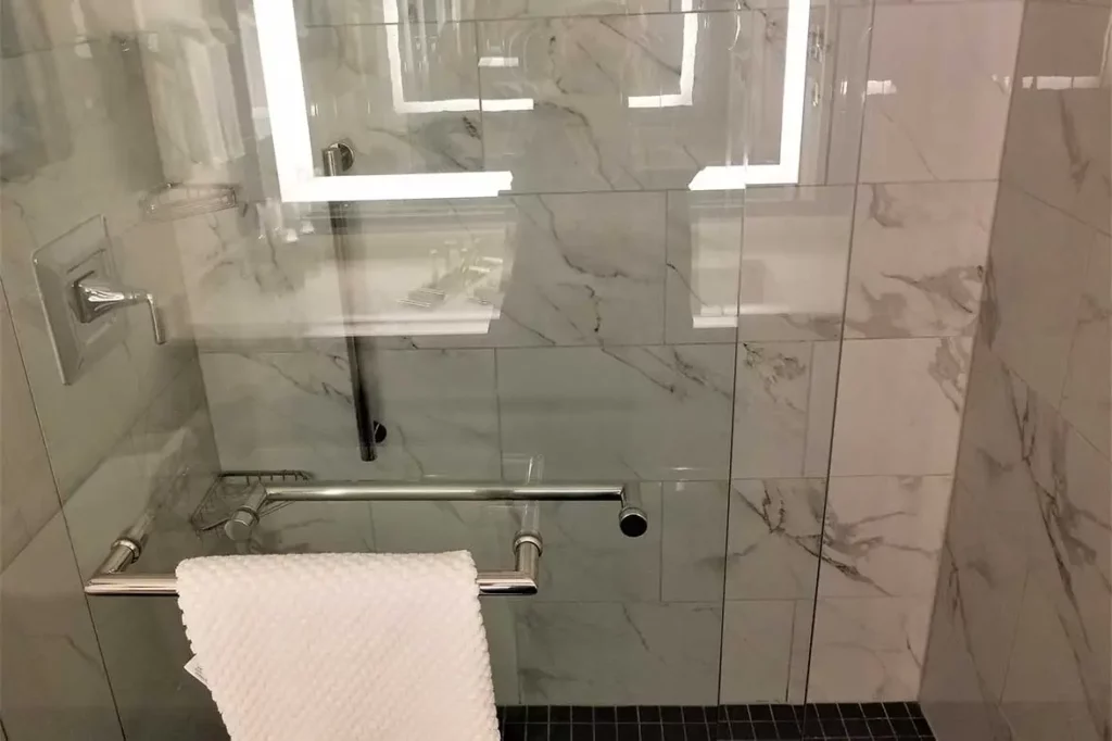 how to install frameless shower door